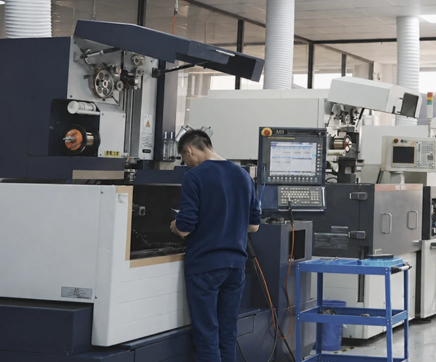 CNC turning machine and operator